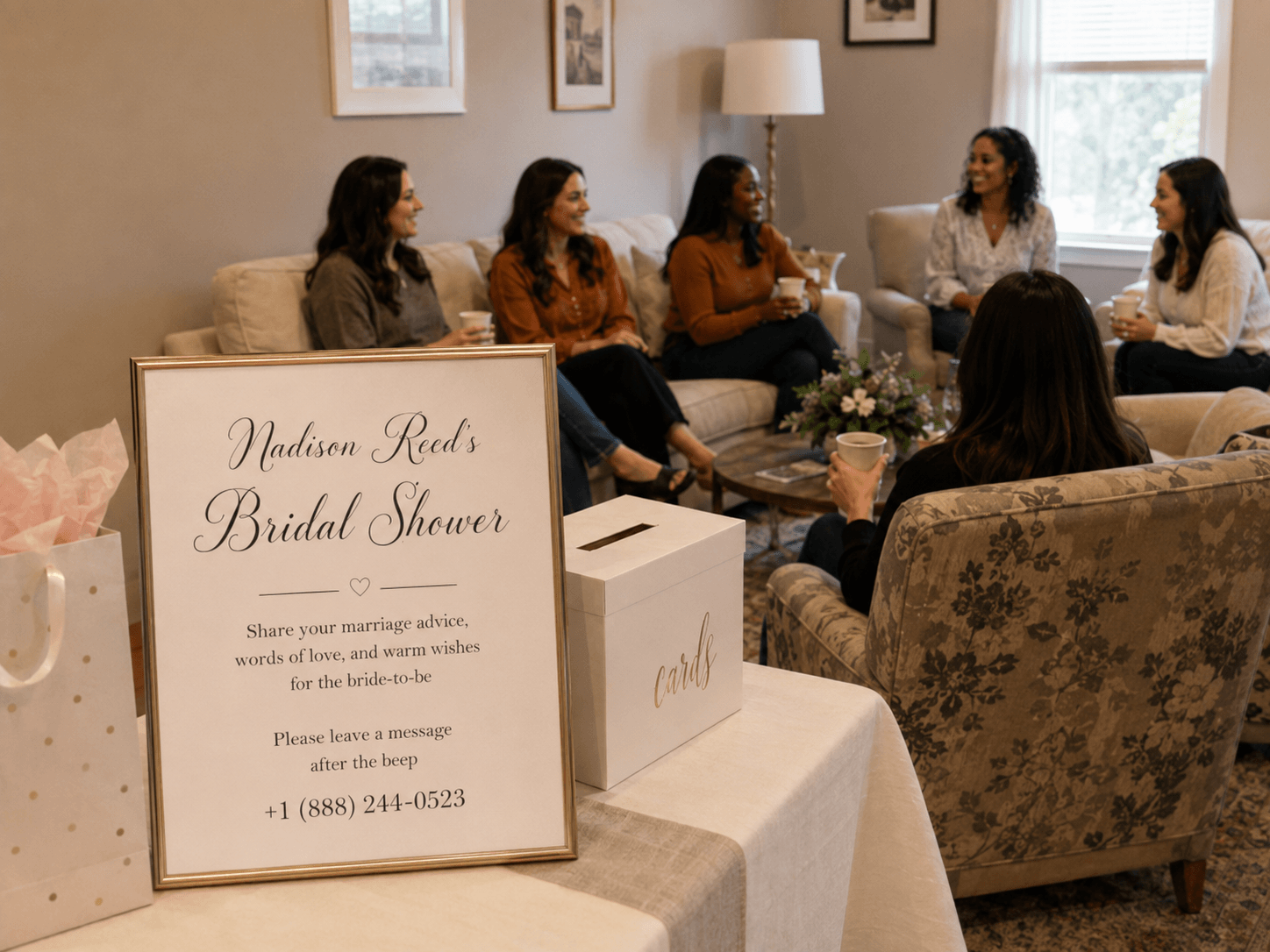 Guests at Madison Reed’s bridal shower beside a framed sign inviting them to call and leave marriage advice for the bride-to-be